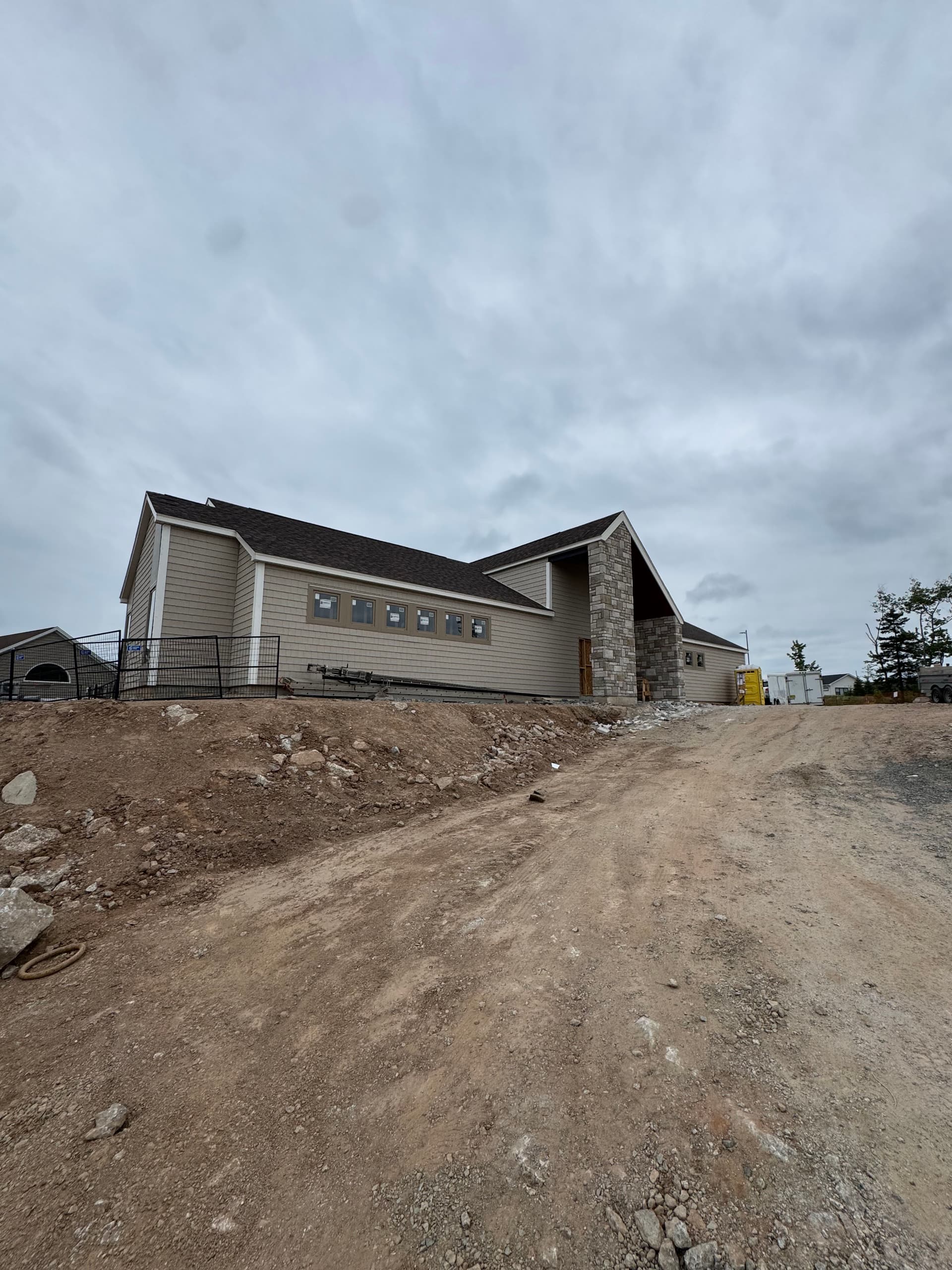 Vinyl Shake Siding, PVC Trim and Custom Soffit Work for a Local Golf Course image
