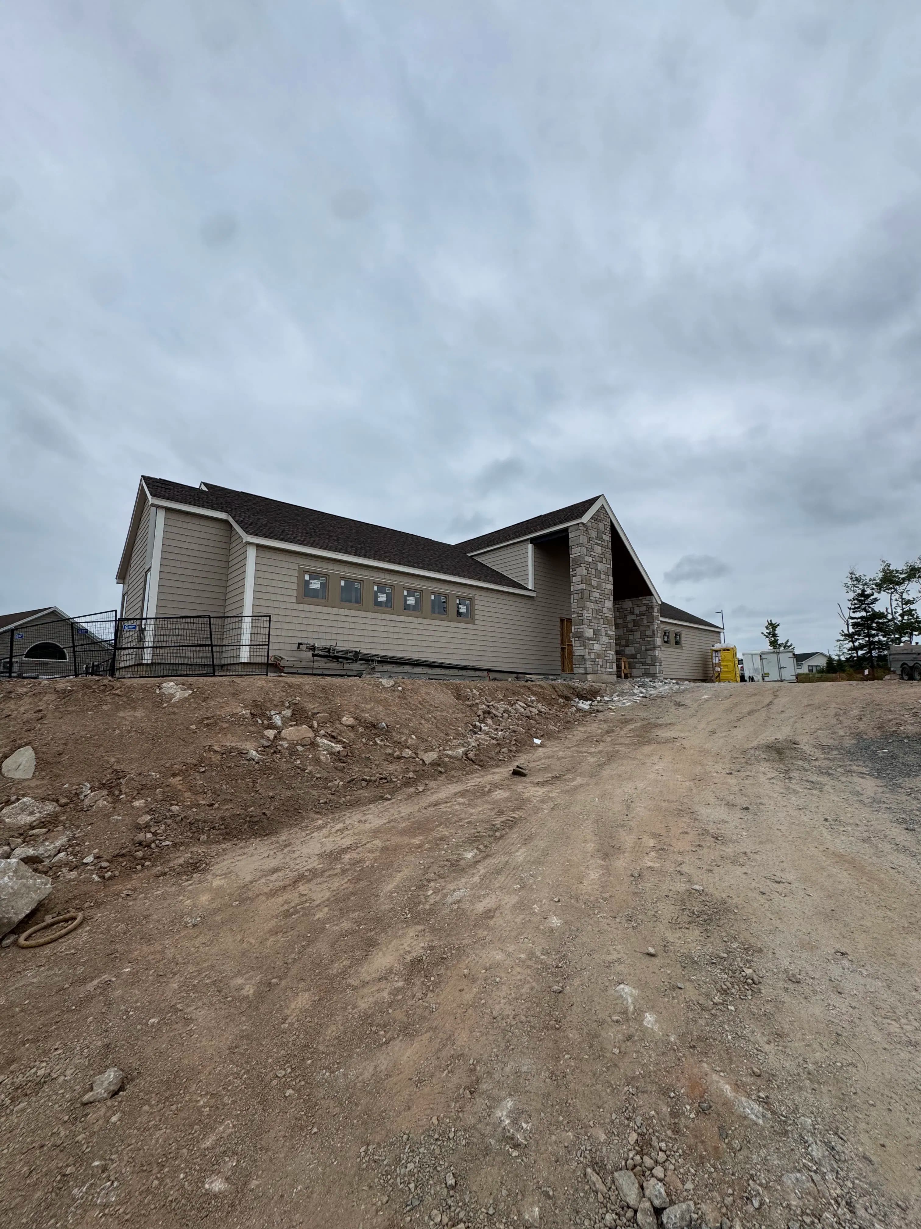 Project Vinyl Shake Siding, PVC Trim and Custom Soffit Work for a Local Golf Course image
