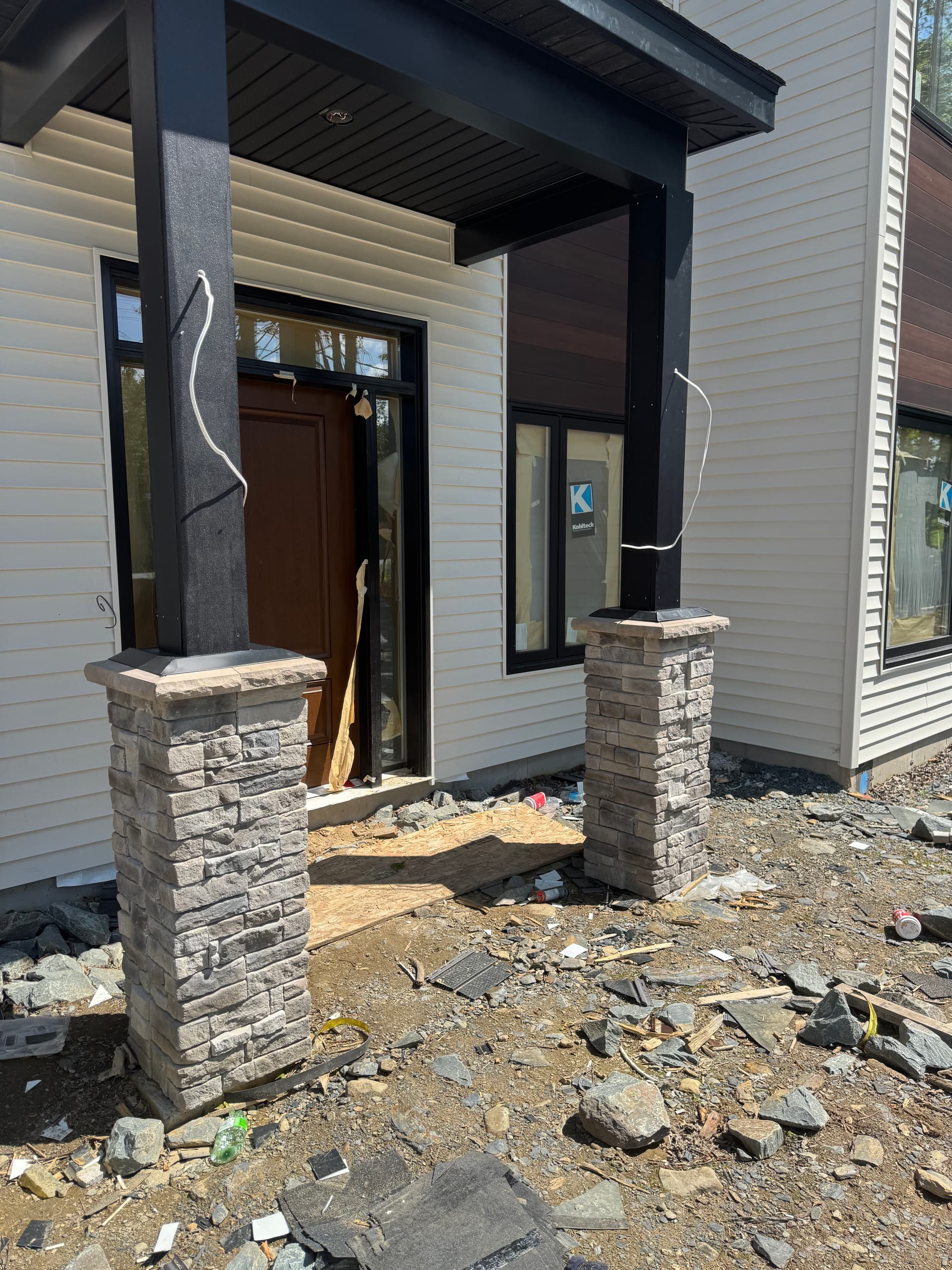 Stone Siding and Soffit Work on a New Build