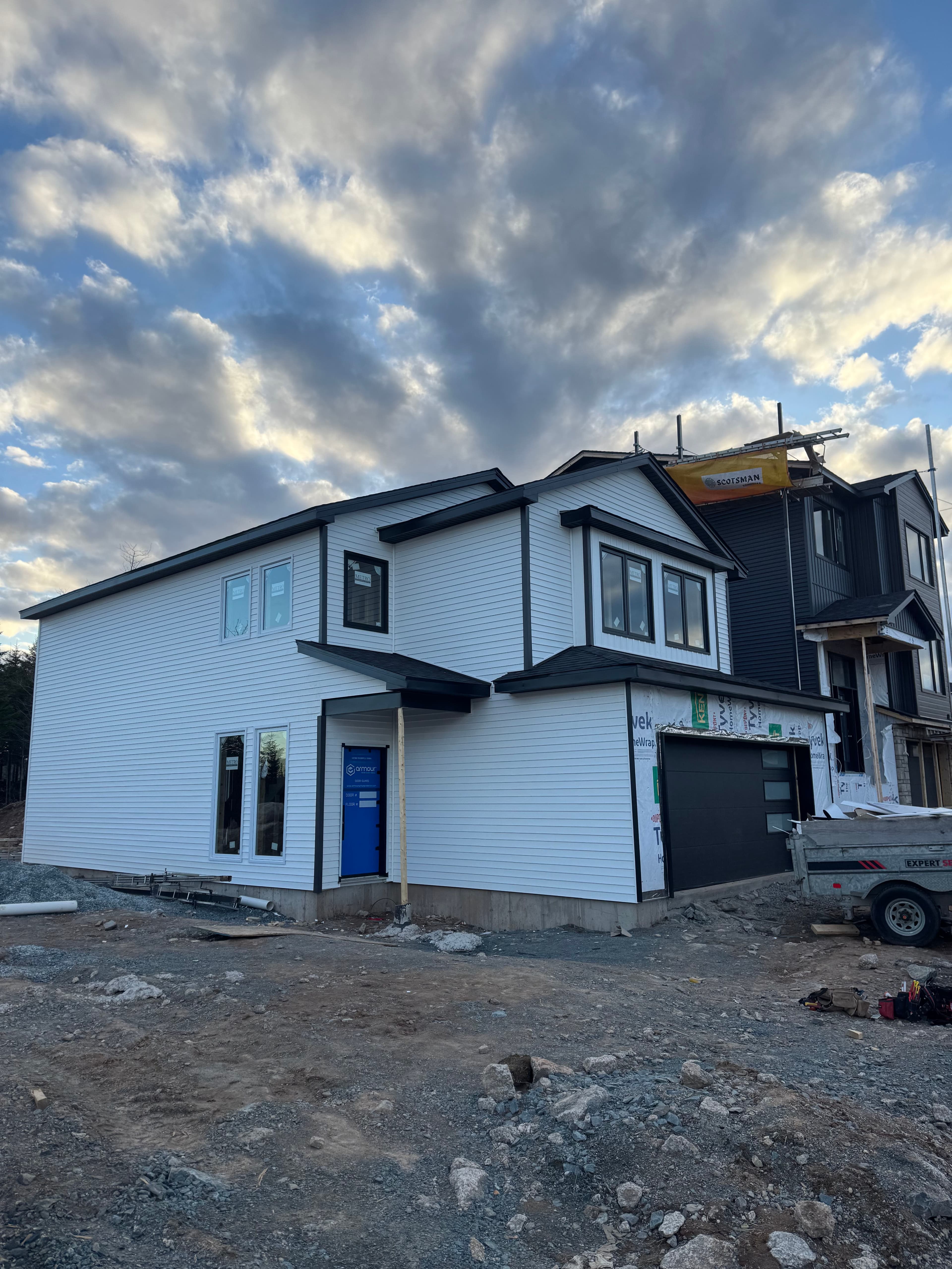 Project New Build Siding and Window Installation Done Right image